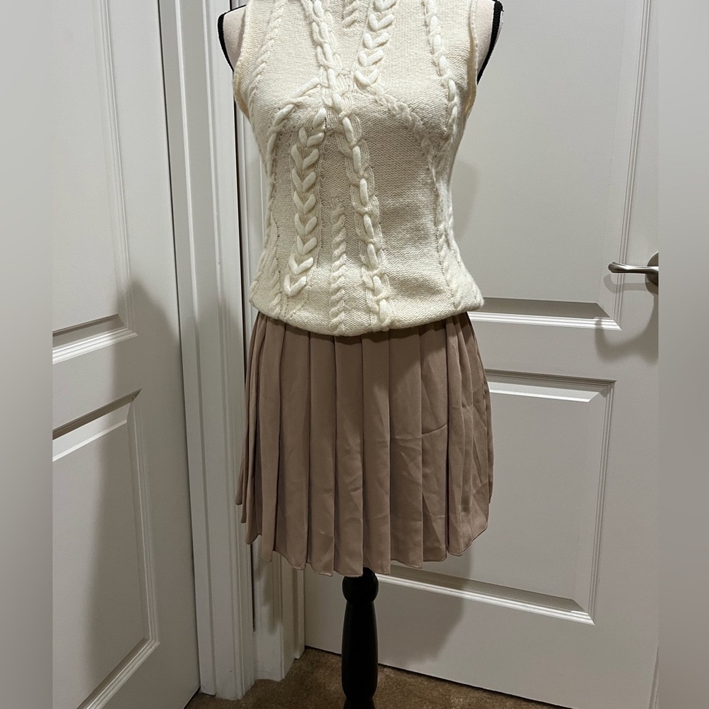 SEE YOU MONDAY PLEATED TAN MINI SKIRT